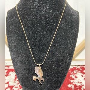 Two Tone Eagle Pendant on a Gold Tone Necklace